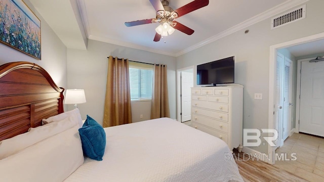 375 Beach Club Trl Unit A-1608, Gulf Shores, AL 36542 - bedroom with crown molding and ceiling fan