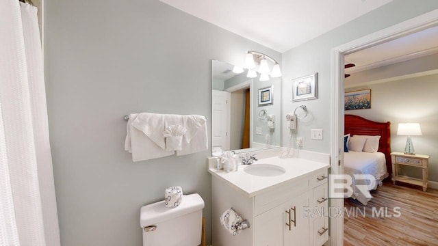 375 Beach Club Trl Unit A-1608, Gulf Shores, AL 36542 - ensuite bathroom with vanity, wood finished floors, and toilet