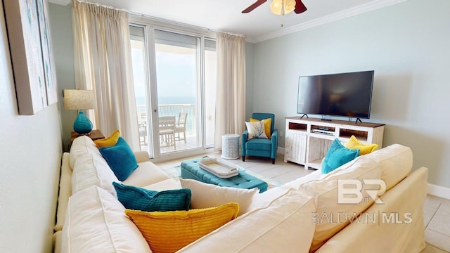 375 Beach Club Trl Unit A-1608, Gulf Shores, AL 36542 - living room featuring a ceiling fan, ornamental molding, and baseboards