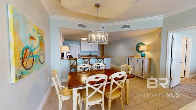 375 Beach Club Trl Unit A-1608, Gulf Shores, AL 36542 - dining space with light tile patterned floors, ornamental molding, baseboards, and a chandelier