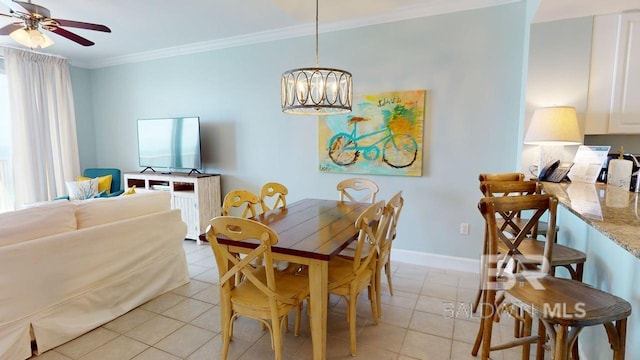 375 Beach Club Trl Unit A-1608, Gulf Shores, AL 36542 - dining space featuring crown molding, light tile patterned floors, a chandelier, a ceiling fan, and baseboards