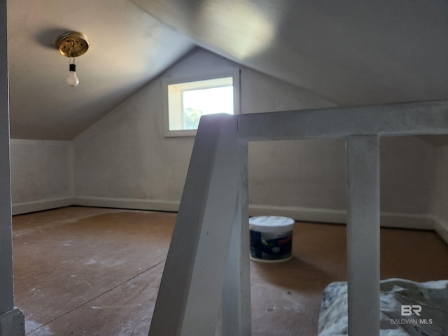 bonus room featuring lofted ceiling