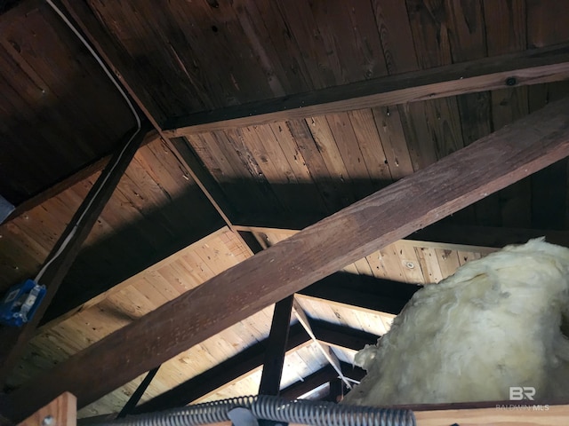 room details featuring beam ceiling and wooden ceiling