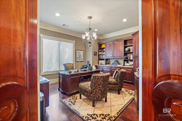 office with an inviting chandelier, crown molding, and hardwood / wood-style flooring