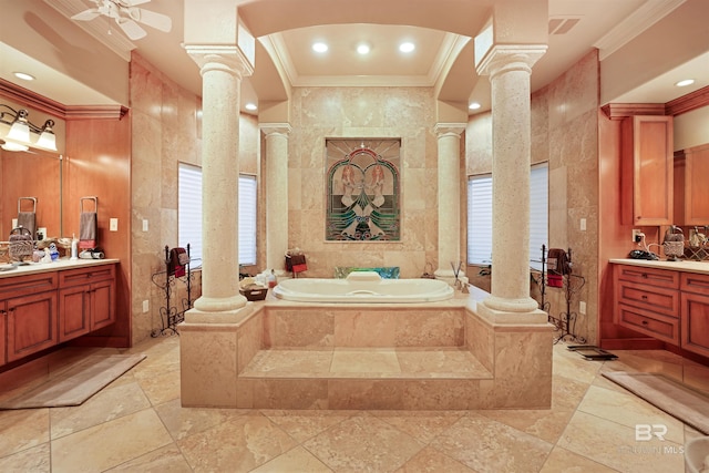 bathroom with ornamental molding, decorative columns, and tile walls