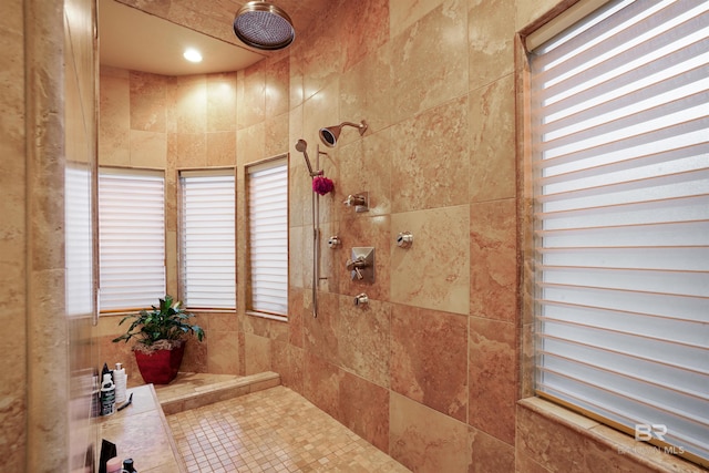 bathroom with tiled shower