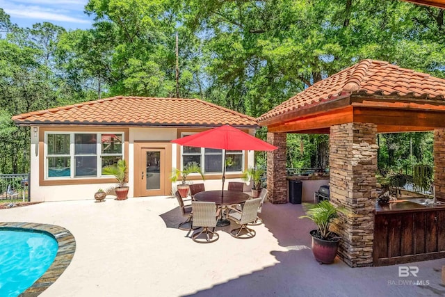 view of patio featuring a gazebo