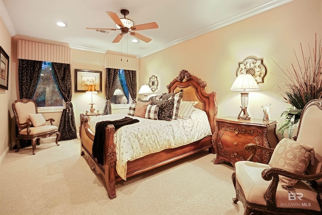 bedroom with crown molding, ceiling fan, and carpet flooring