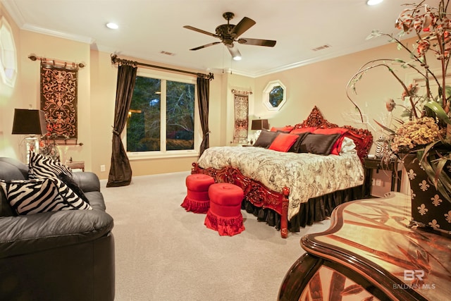 carpeted bedroom featuring ornamental molding and ceiling fan