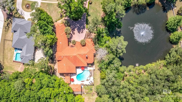 birds eye view of property featuring a water view