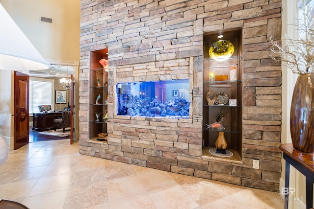 living room featuring a towering ceiling