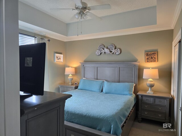 bedroom featuring ceiling fan and ornamental molding