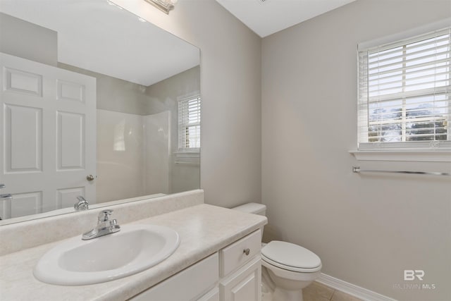 17570 Driskell Rd, Loxley, AL 36551 - bathroom featuring vanity, tile patterned flooring, and a shower