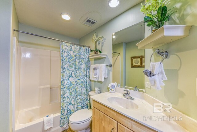 521 W Beach Blvd Unit 2102, Gulf Shores, AL 36542 - full bathroom featuring vanity, shower / bathtub combination with curtain, toilet, and recessed lighting