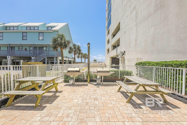 521 W Beach Blvd Unit 2102, Gulf Shores, AL 36542 - surrounding community with a patio