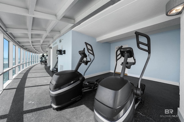521 W Beach Blvd Unit 2102, Gulf Shores, AL 36542 - gym featuring beamed ceiling, baseboards, and coffered ceiling
