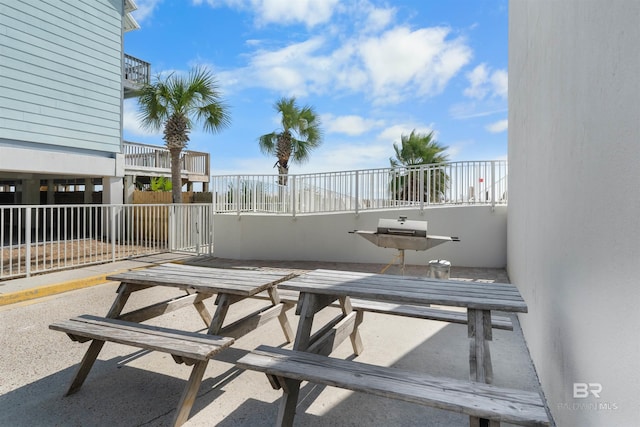 521 W Beach Blvd Unit 2102, Gulf Shores, AL 36542 - view of patio featuring a balcony