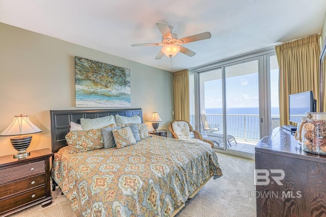 521 W Beach Blvd Unit 2102, Gulf Shores, AL 36542 - bedroom with carpet flooring, access to outside, floor to ceiling windows, and ceiling fan