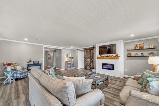 22310 Early Dawn Cir, Foley, AL 36535 - living room featuring recessed lighting, baseboards, and wood finished floors
