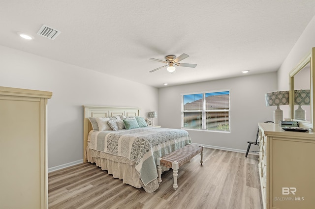 22310 Early Dawn Cir, Foley, AL 36535 - bedroom with baseboards, ceiling fan, visible vents, and light wood-style flooring