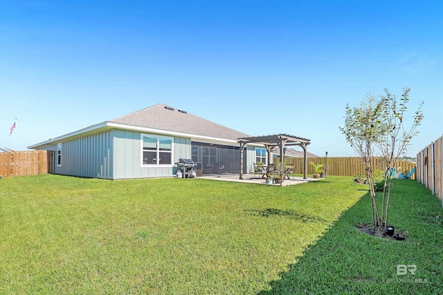 22310 Early Dawn Cir, Foley, AL 36535 - rear view of house with a pergola, board and batten siding, a fenced backyard, a lawn, and a patio