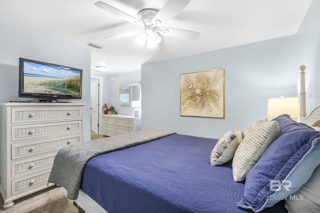 bedroom featuring ceiling fan, visible vents, and carpet flooring