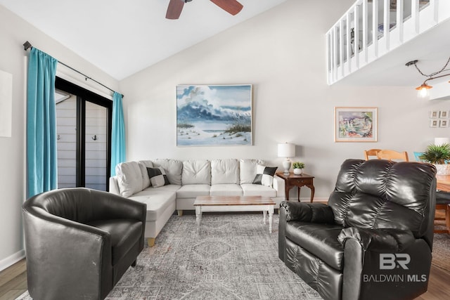 living room with high vaulted ceiling, wood finished floors, a ceiling fan, and baseboards