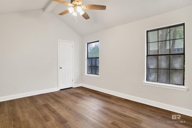 spare room featuring wood finished floors, a ceiling fan, and baseboards