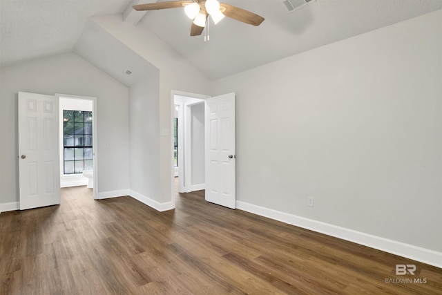 unfurnished bedroom featuring dark wood finished floors, baseboards, and a ceiling fan