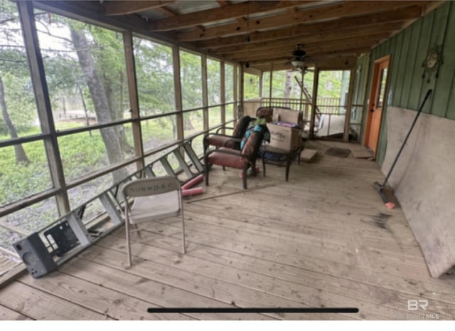 sunroom / solarium with ceiling fan