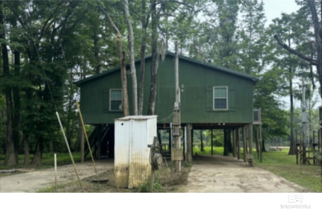 view of outdoor structure with a carport