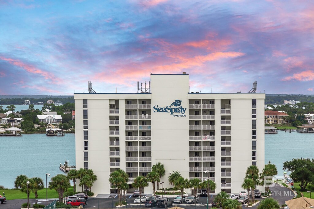 16284 Perdido Key Dr Unit 815, Perdido Key, FL 32507 - property at dusk featuring a water view