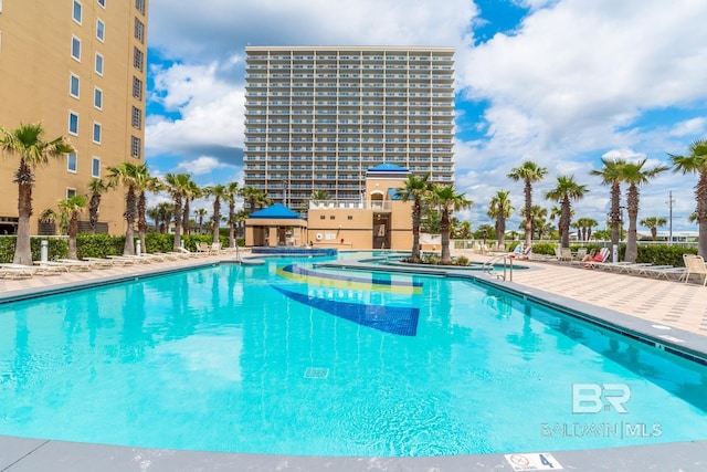 pool with a patio area