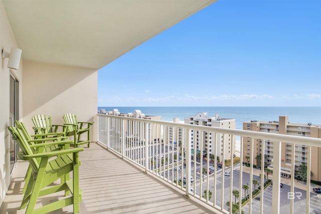 balcony featuring a water view