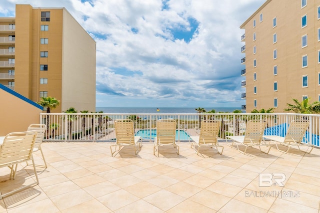 view of patio / terrace with a water view