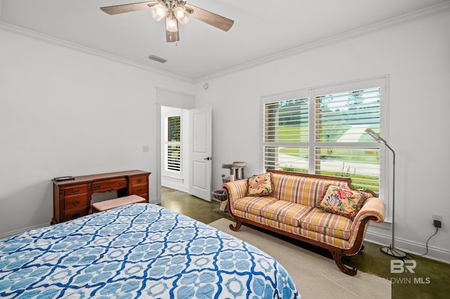 bedroom with ceiling fan and crown molding