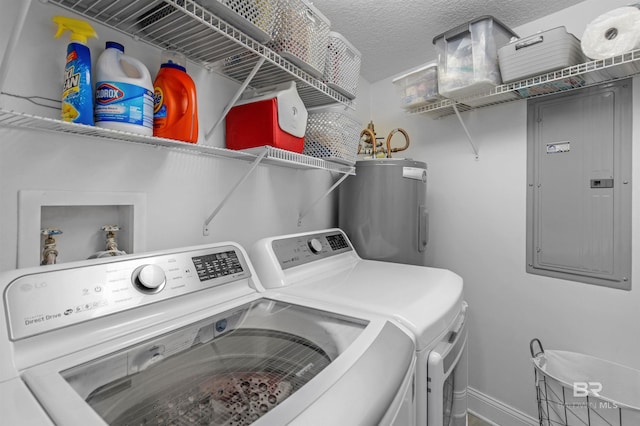 laundry room featuring a textured ceiling, water heater, electric panel, and washer and dryer