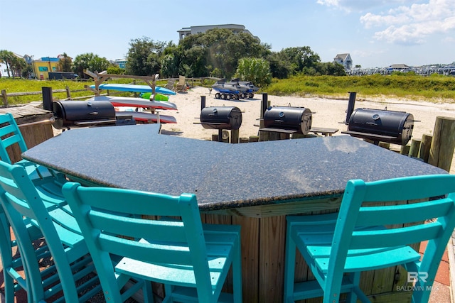 view of patio with a grill