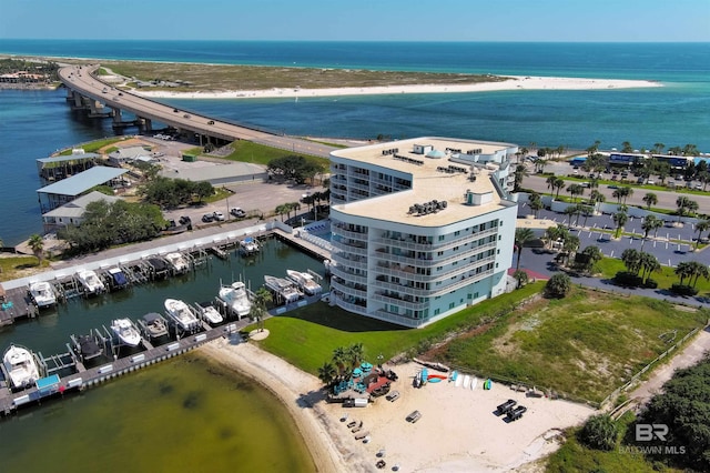 bird's eye view with a view of the beach and a water view