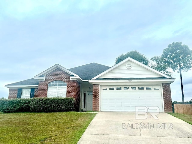 single story home featuring a front yard and a garage