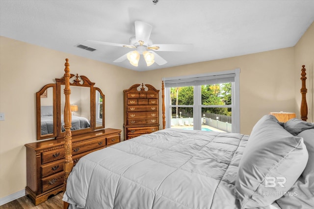 bedroom with wood-type flooring and ceiling fan