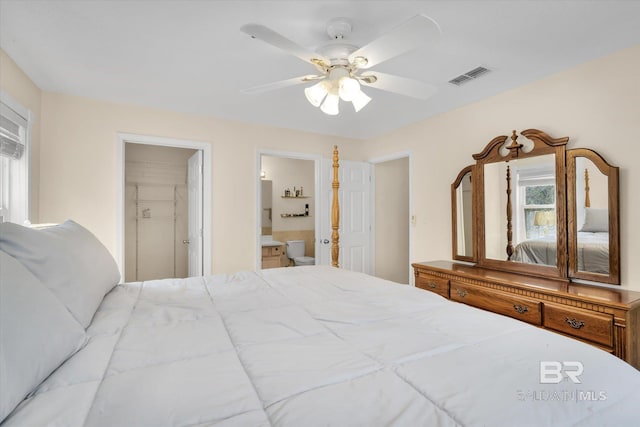 bedroom with ceiling fan and connected bathroom