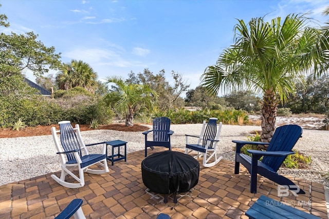 view of patio / terrace with a fire pit and area for grilling