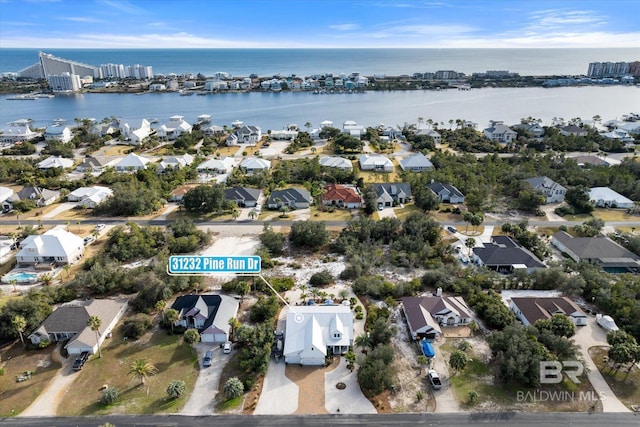 drone / aerial view with a water view