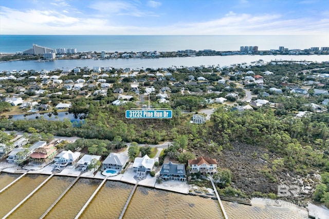 drone / aerial view featuring a water view