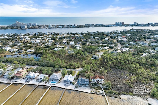 drone / aerial view with a water view