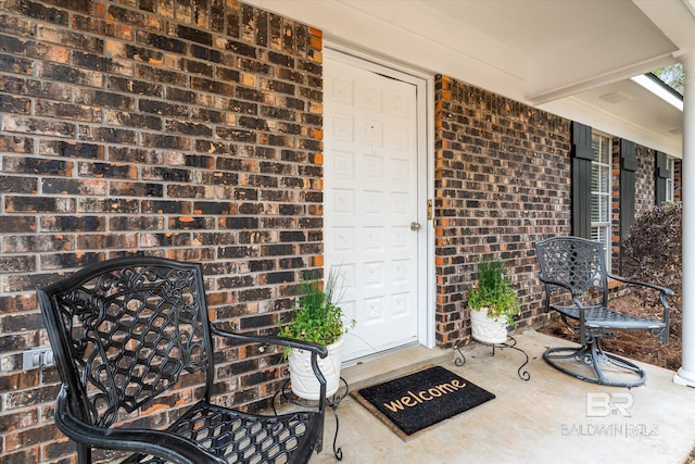 doorway to property featuring a porch