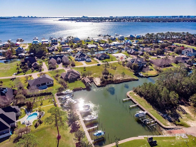 aerial view featuring a water view and a residential view