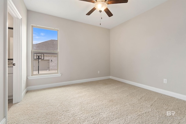 carpeted empty room with ceiling fan