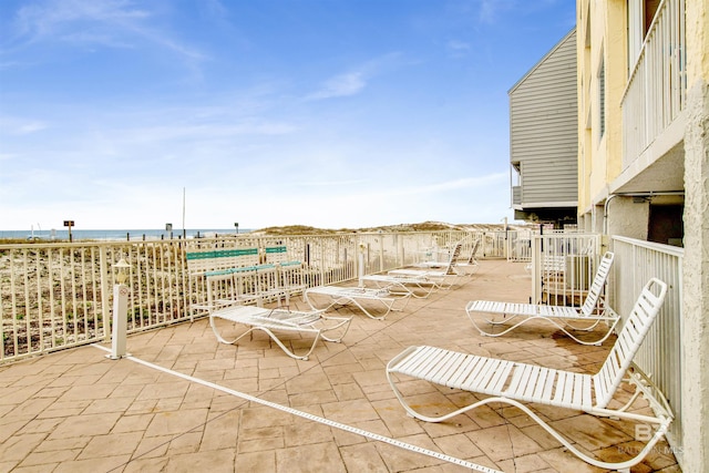 view of patio / terrace featuring a water view